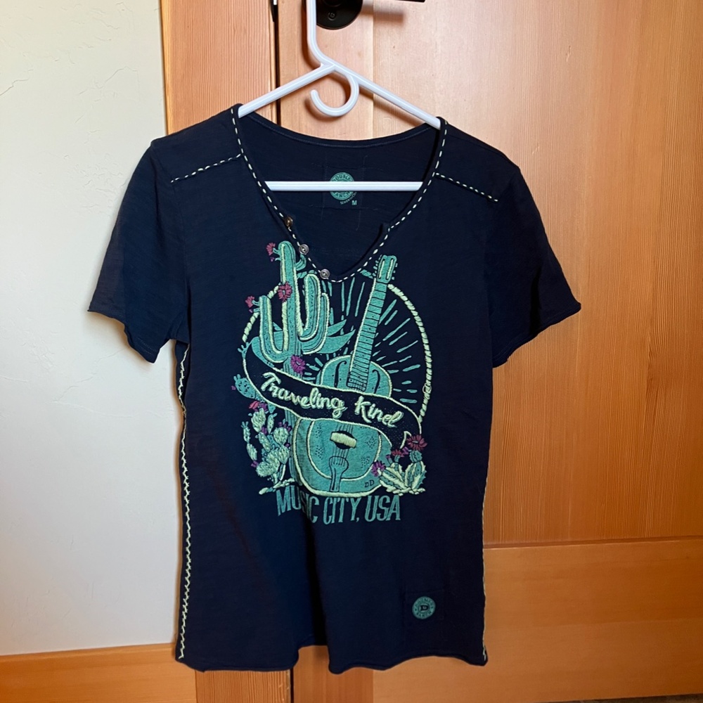 Double D Ranch, Size Medium Traveling Kind Medium Tee with embroidery